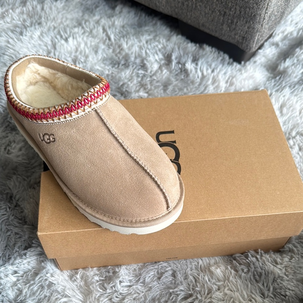 UGG Beige Suede Slippers with Red Trim. BRAND NEW never worn!